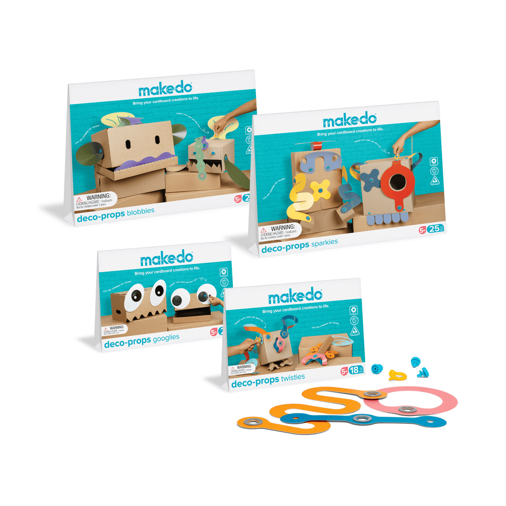 Makedo Deco-Props range with some parts scattered in front.